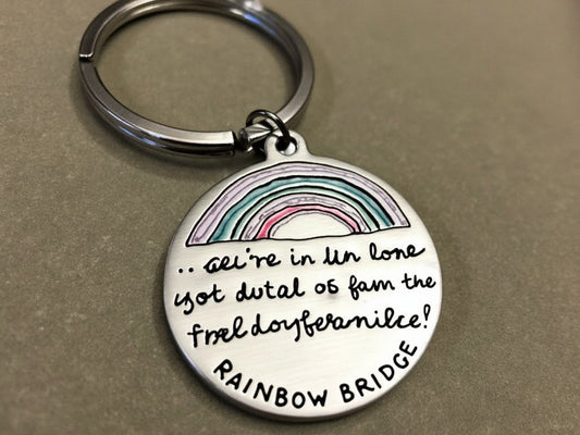 Definitely Pet Memorial Keychains focusing on the Rainbow Bridge concept.