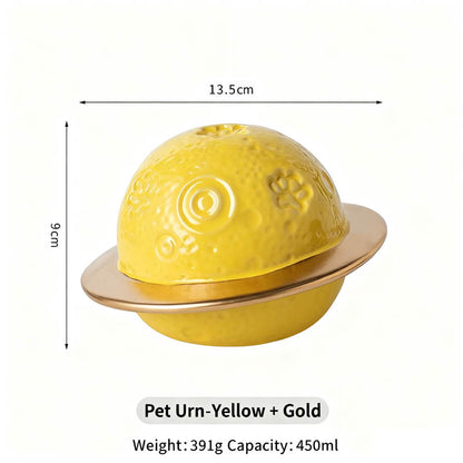 Yellow pet urn with gold accents and measurements on a white background