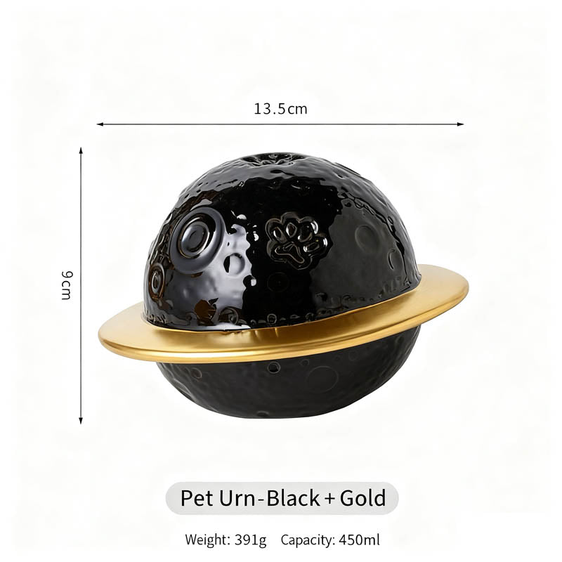 Black pet urn with gold lid on a white background, showing dimensions and weight.