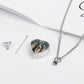Heart-shaped photo locket with a dog's face on a white surface