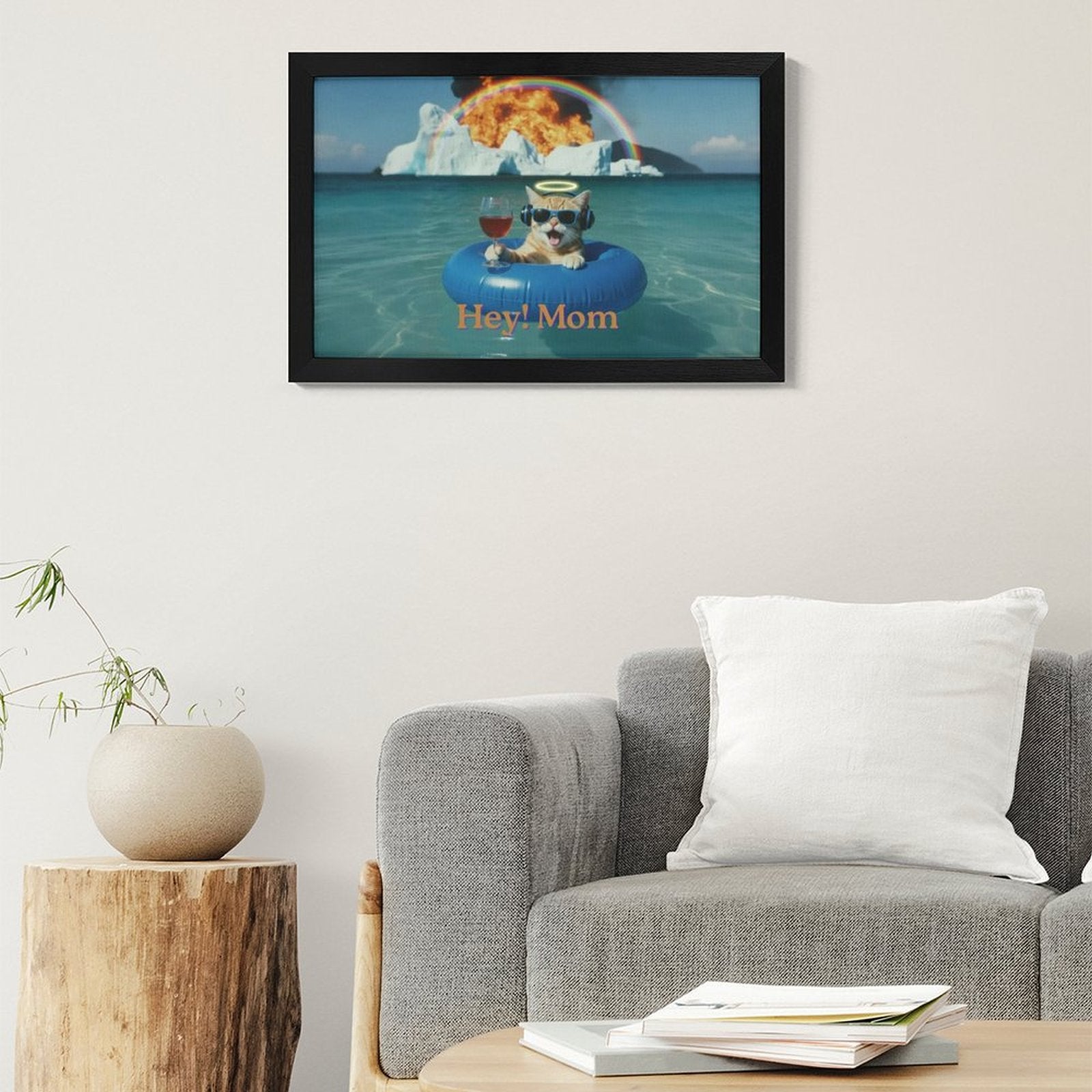 Framed artwork of a dog on an inner tube with text 'Hey! Mom' in a living room setting.