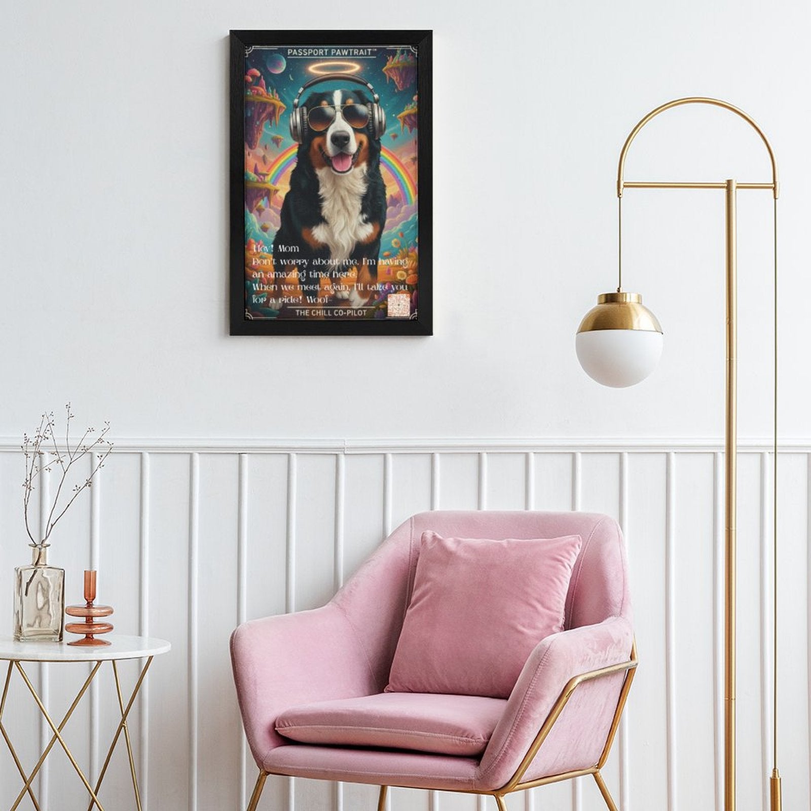 Pink armchair in a room with a framed poster of a dog wearing headphones on the wall.